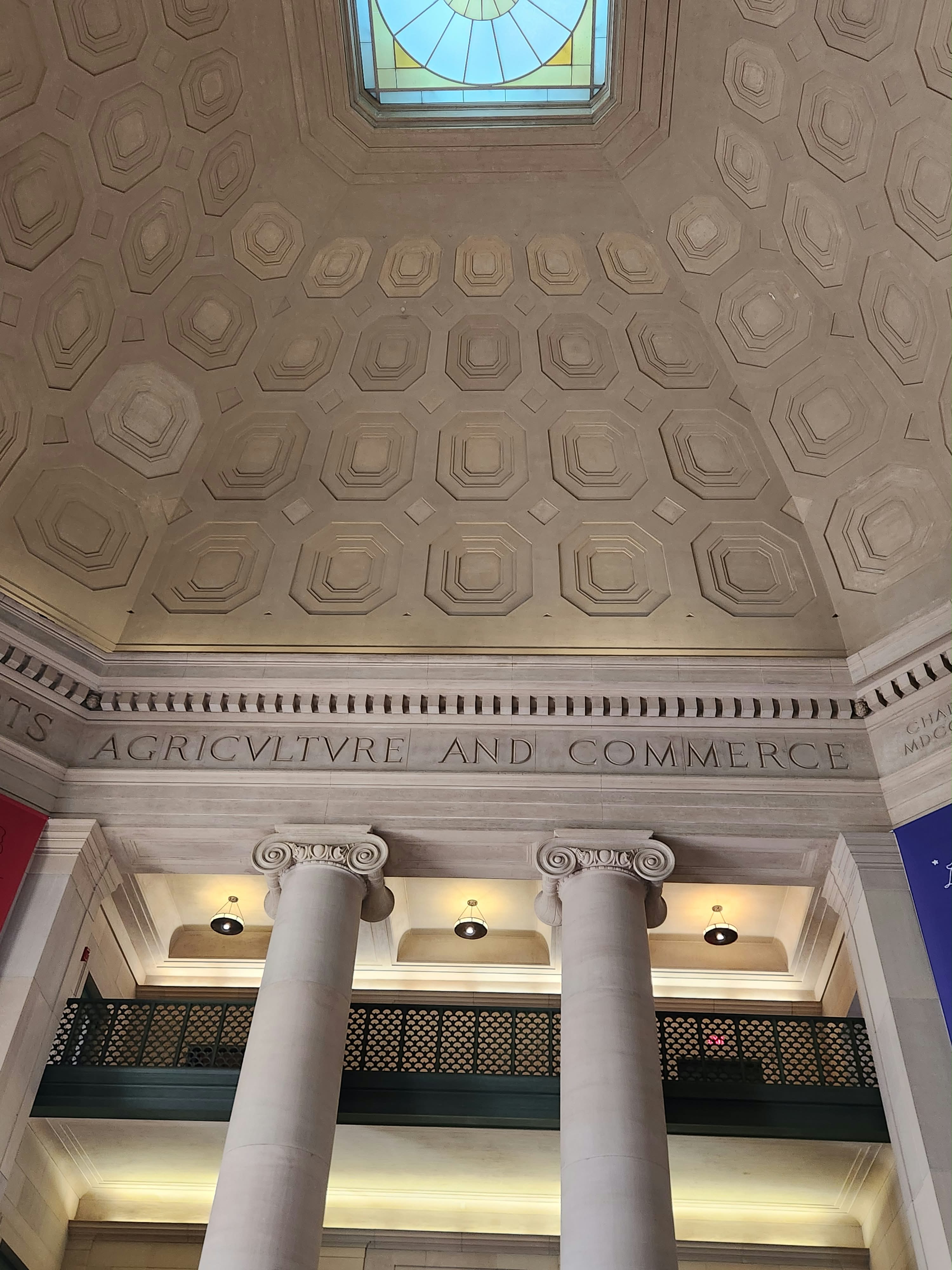 Ornate ceiling and columns inside a Boston building